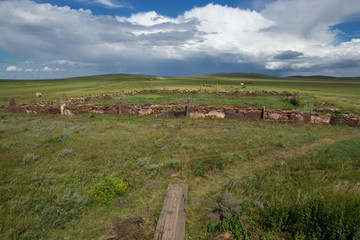 Stone masonry of ancient royal burial mounds. Valley of the Kings in Khakassia. Russia.