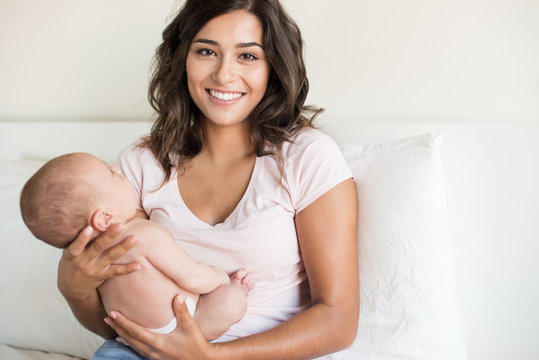Mother holding newborn baby
