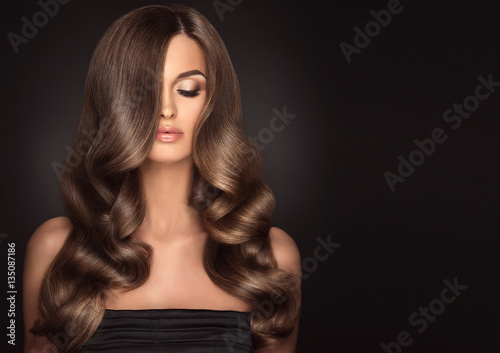 Brunette Girl With Long And Shiny Wavy Hair Beautiful