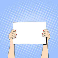 Female hands holding a white blank banner, pop art style. Vector