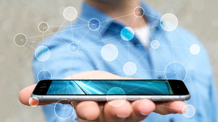 Businessman using digital data network with mobile phone 3D rend
