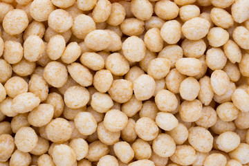 Corn flakes rings on the background.