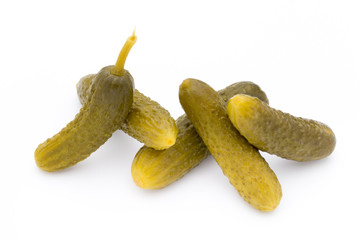 Marinated pickled cucumbers isolated on the white.