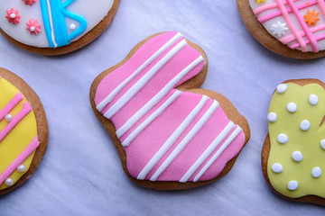 Closeup of colourful Easter cookies on white background