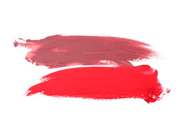 Smudged lipstick on white background