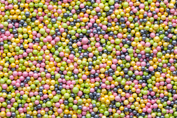 Multicoloured sweet sugar balls. Small ball pattern.