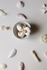 group of garlic on white background, contemporary vibrant pop food