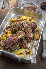 Lamb Knuckle with Fried Potatoes in Roasting Dish