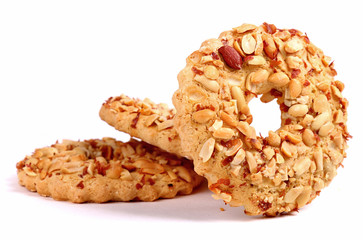 Three cookies covered with a peanuts