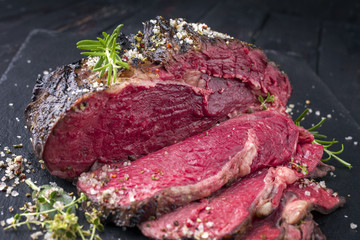 Barbecue adged Wagyu Rib Eye Steak Bleu as close-up 