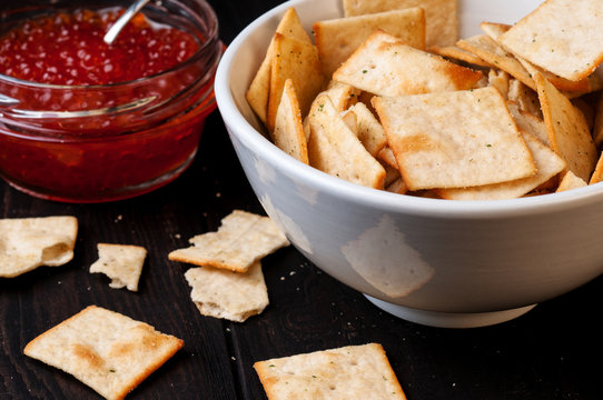 crackers and red caviar