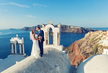 Obraz premium Wedding couple in Santorini