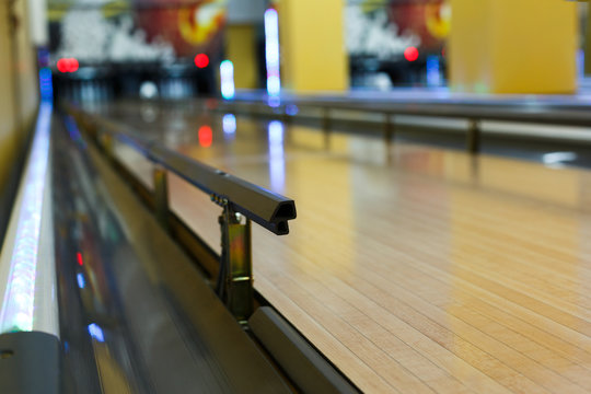 Bowling alley background, lane with bumper rails
