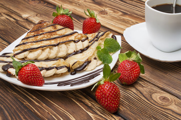 Crepes with Banana and strawberries