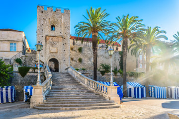 Korcula old city gate. / View at famous landmark in Korcula town, Revelin tower, croatian travel...