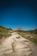 walking along a mountain trail