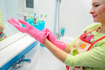 people, housework and housekeeping concept - happy woman cleanin