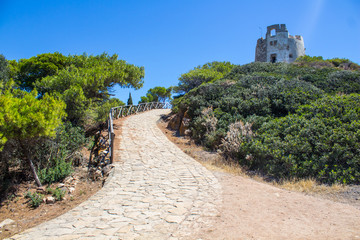 Italy Sardinia Torre di Chia way from tower in sun day