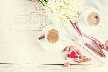 espresso, heart and bouquet of flowers