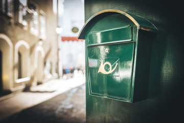 Green mail box on the sreets of Salzburg, Austria