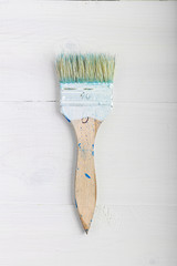Paint brush on the table, top view