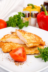 Juicy chicken fillet in beer batter with herbs and spices