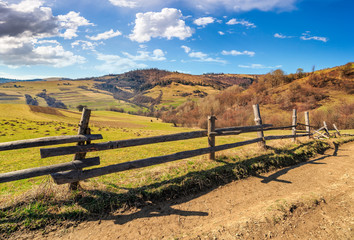Fototapeta na wymiar wooden fence on the hillside