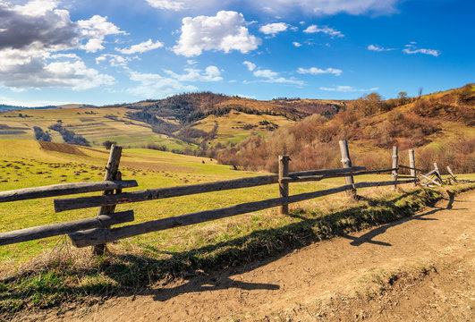 wooden fence on the hillside
