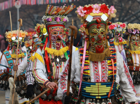 PERNIK, BULGARIA - JANUARY 29, 2017 - Masquerade festival Surva in Pernik, Bulgaria. People with mask called Kukeri dance and perform to scare the evil spirits