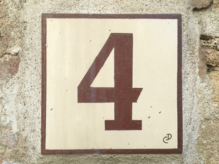 Ceramic tile with numer four 4