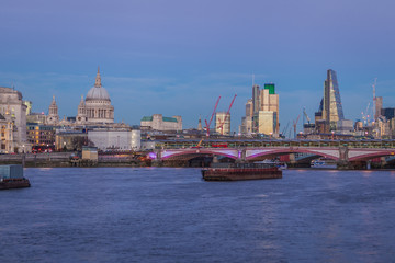 dusk in London with river Thames, St Paul Cathedral and skyline