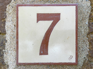 Ceramic tile with numer seven 7