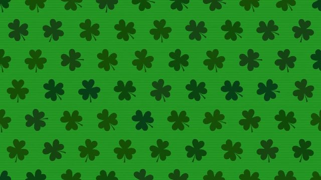 St. Patrick's animated clovers against a bright green background. For use as a general backdrop, design element or as an overlay for placement of text or other copy.	