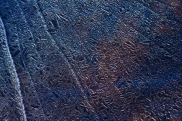 Ice pattern background on the surface of pond or river.
