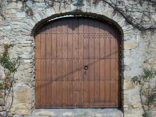 Wooden gate with door knocker