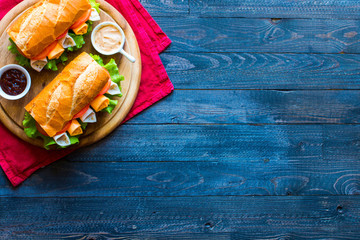 Delicious and Tasty sandwiches with turkey, ham, cheese, tomatoe