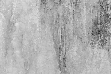 Frozen waterfall with ice in winter.