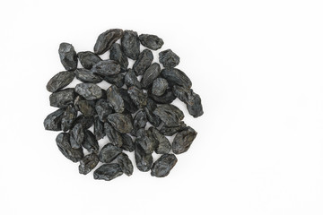 Black raisins on white