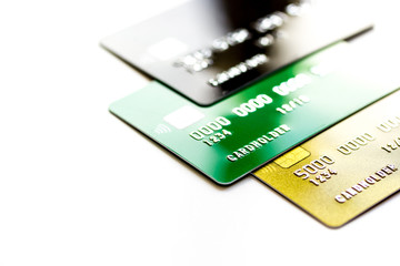 pile of credit cards on white background