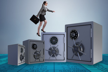 Businesswoman walking on top of safe