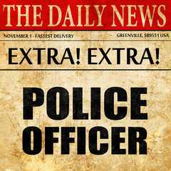 Fototapeta premium police officer, newspaper article text