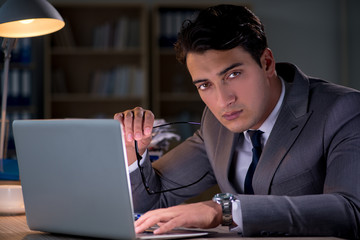 Man staying in the office for long hours