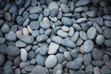 Grey, blue, gold wee pebbles background, South Miami Beach, Florida, USA