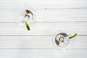 martini cocktail top view of wooden background