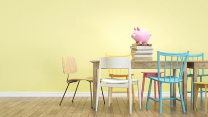 Piggy bank sits on a table with several chairs. I have just finished meeting.