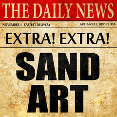 sand art, newspaper article text