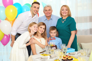 Family celebrating mother's birthday