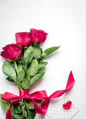 concept Valentine's Day with flower white background top view