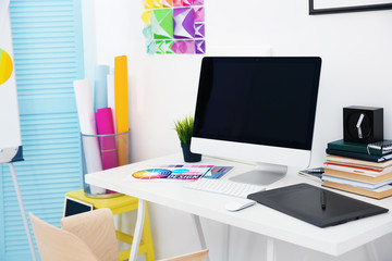 Modern designer workplace with computer