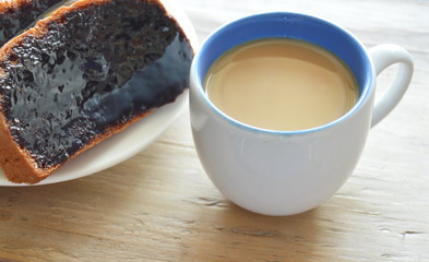 bread slice dressing creamy chocolate sauce and coffee